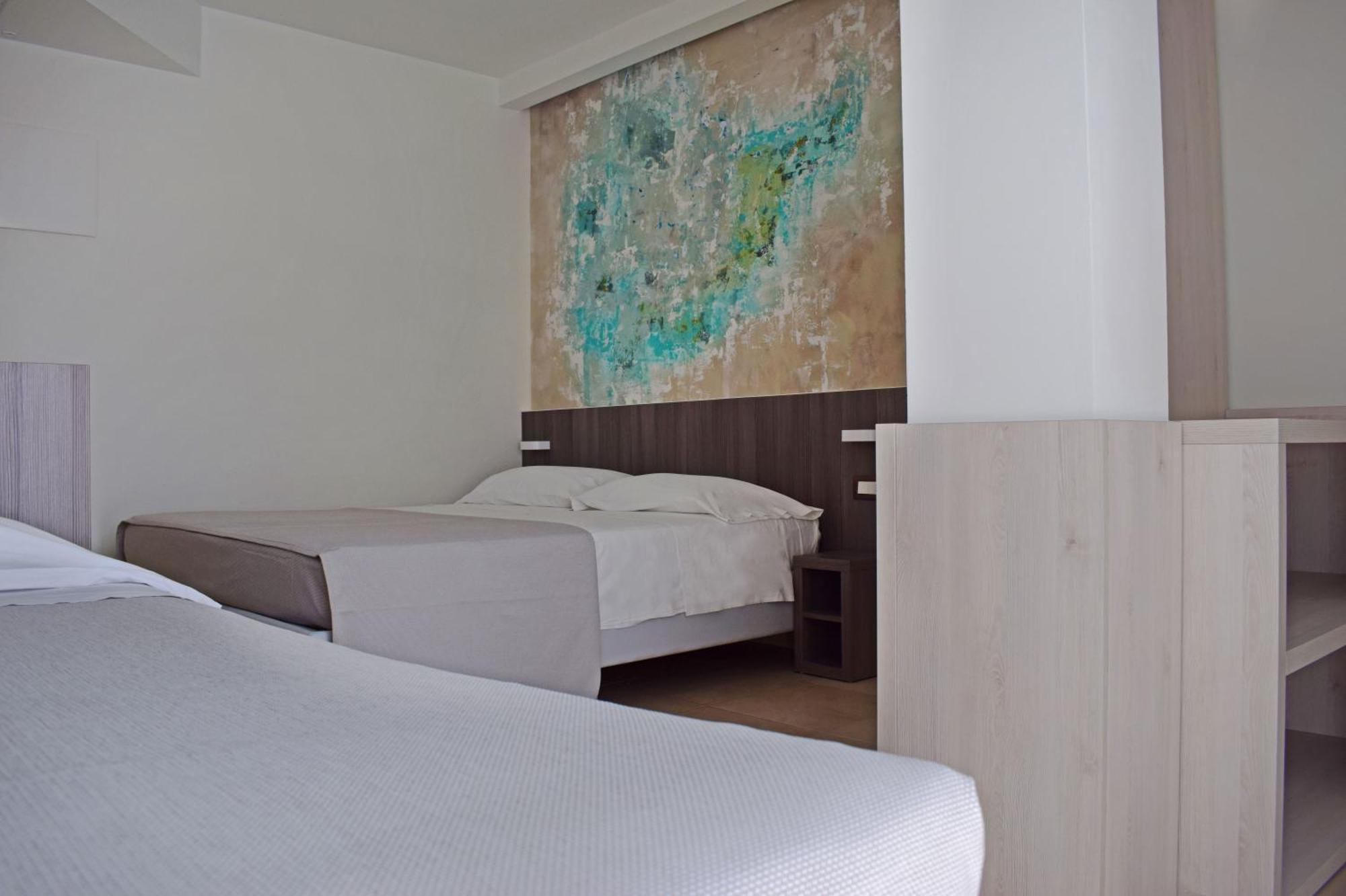 Hotel Muccioli Misano Adriatico Pokoj fotografie